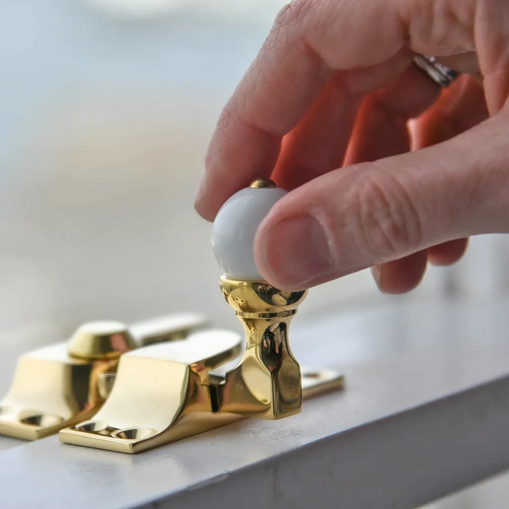 Polished Brass Sash Window Fastener with White Knob